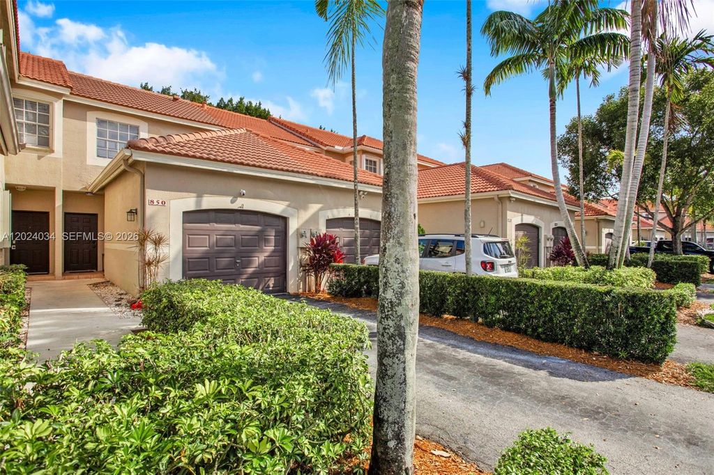 Photo of 850 Sorrento Dr, Weston, FL 33326 (MLS # A12024034)
