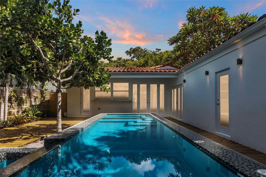 Immaculate Bungalow in coveted Belle Meade. This 4 Bedroom, + 4 Bath fully renovated pool home features cathedral ceilings, hardwood floors, impact windows and doors throughout, ample Chef's kitchen with custom dark wood cabinetry and stainless steel appliances, a great outdoor deck with an Infinity pool with waterfall and hot tub and impeccably renovated bathrooms. The secluded Master suite has a large walk-in closet with an oversized bathroom with a double walk-in shower featuring a rain shower and French doors to pool deck. Home is available starting mid July.
Belle Meade is a gated community in the heart of Miami's trendy MiMo District and offer a strategic location with great walkability.