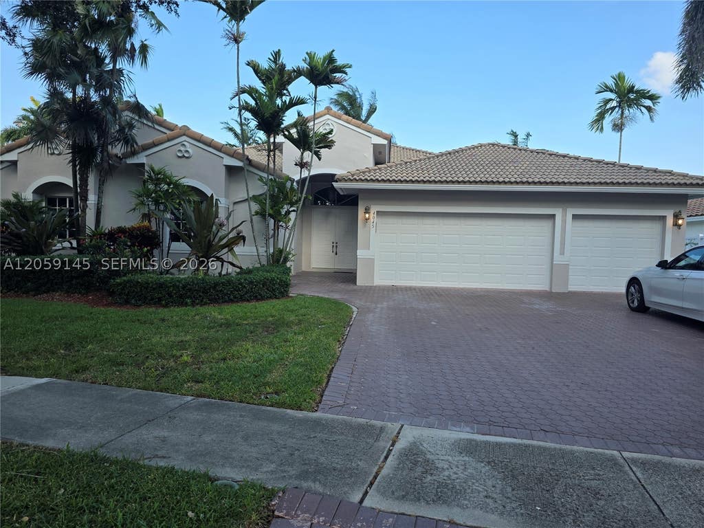 Photo of 4045 SW 151st Ter, Miramar, FL 33027 (MLS # A12059145)