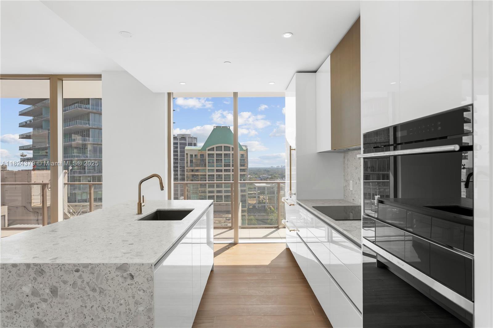 Luxury living in this stunning 3-bedroom, 3.5-bath corner residence at the brand-new Mr. C Tigertail Residences. Featuring 1,733 SF of beautifully designed interiors and a 438 SF wrap-around terrace with sweeping views of Coconut Grove. The spacious layout is enhanced by 11-foot floor-to-ceiling windows and high-end finishes throughout — including a sleek Italian kitchen by Italkraft with terrazzo and quartz countertops, Sub-Zero appliances, European porcelain tile flooring, and solid-core wood doors. Residents enjoy 5-star amenities such as 24-hour concierge, two resort-style pools with food and beverage service, a state-of-the-art gym, spa, on-site dining, and valet parking for two vehicles. Located in the heart of the Grove, just steps from the best shops, dining, and entertainment.