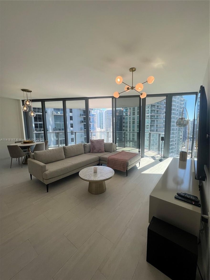 Come live in this beautifully furnished 2 bed/2.5 bath at Brickell Flatiron. Centrally located in the heart of Brickell with stunning amenities including a rooftop pool, fitness center and spa. Building also features club rooms, movie theatre, kids play room and billiard lounge. Walking distance to supermarkets, restaurants and the shops at Brickell City Centre and Mary Brickell Village. Unit is ready to move in, just bring your belongings