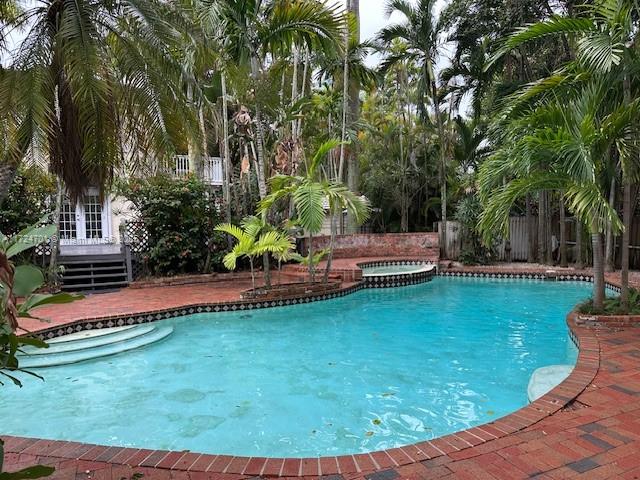Fantastic and seldom-available opportunity to live in a single family home on Historic South Miami Avenue, centrally located near Coconut Grove and Key Biscayne, and within walking distance to Downtown Brickell's many fine amenities. Charming home features a large outdoor deck and pool area for entertaining. Live in the heart of the city within your own private sanctuary.