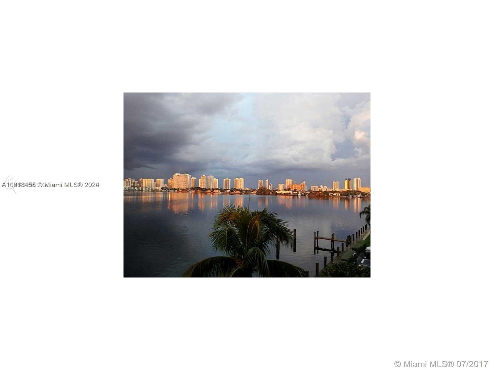 GATED AND PRIVATE COMMUNITY IN N MIAMI BEACH IN A COMMUNITY THAT IS BEAUTIFUL, WELL KEPT AND PRIVATE. THE POOL FACES THE WIDE BAY AND THE TENNIS COURTS ARE AVAILABLE TO ALL RESIDENTS OF THE REEF CLUB. THIS UNIT HAS TILE FLOORS THROUGHOUT SPLIT FLOORPLAN AND IS MODERN AND UPDATED. THE VIEWS TAKE YOUR BREATH AWAY FROM EVERY WINDOW AND SUPER LARGE BALCONY. IMPACT WINDOWS.