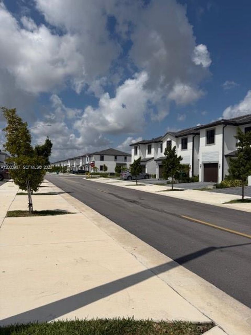 Welcome to this Brand New beautiful townhome with 4 bedrooms and 2.5 bathrooms. Enjoy a modern Kitchen with stainless steel appliances, quartz countertop, The ground floor includes a formal living room, dining area, and a great room that connects to a backyard patio. Includes roll-up blinds and a washer/dryer. The garage has space to store. Hurricane Impact Windows & Doors. Fenced backyard. located close to the Florida City, restaurants, new PUBLIX supermarket and Outlets mall Use show assist, property vacant  and easy to show.