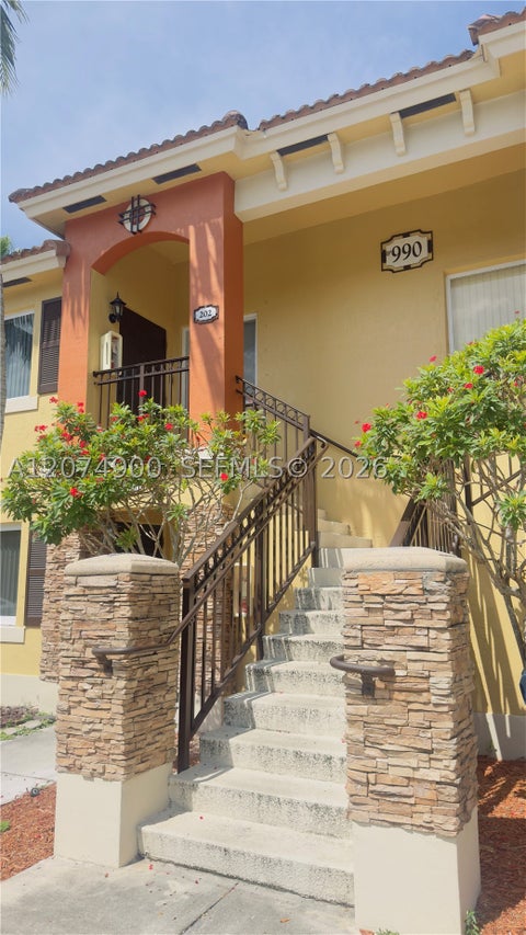 Photo of 990 NE 33rd Ter #202, Homestead, FL 33033 (MLS # A12074900)