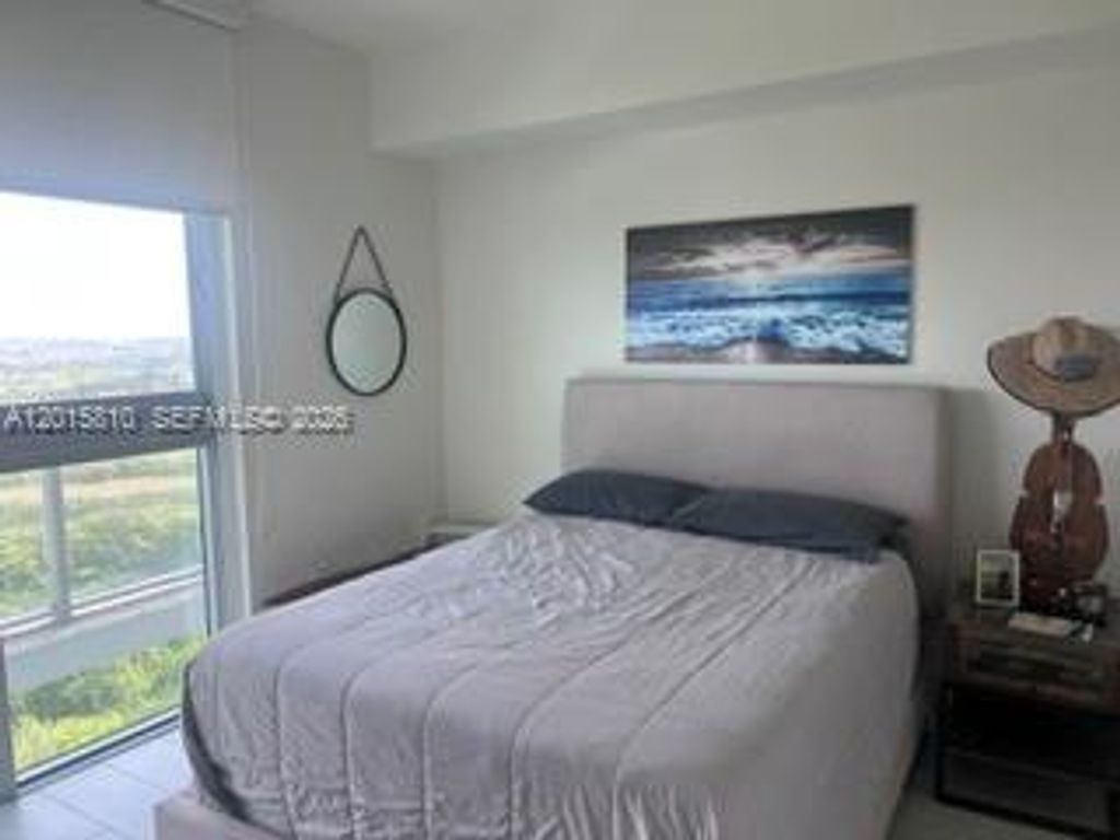 Photo of 2000 Metropica Way #1902, Sunrise, FL 33323 (MLS # A12015810)