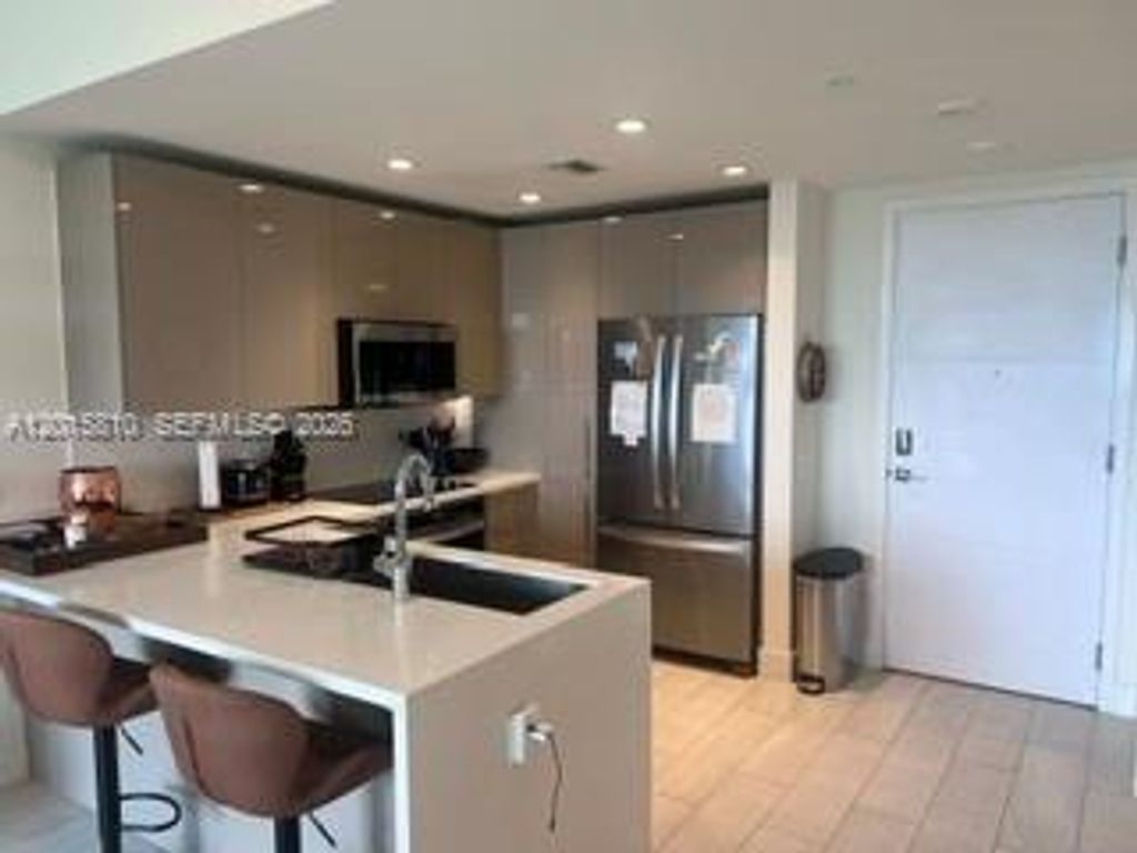Photo of 2000 Metropica Way #1902, Sunrise, FL 33323 (MLS # A12015810)