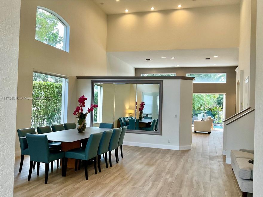 Tastefully remodeled contemporary home featuring 3 spacious bedrooms, a den and 3.5 bathrooms in the prestigious Ibis Golf & Country Club. The master bedroom and den are located on the ground level while 2 additional en-suite bedrooms are located on the 2nd level. An outdoor patio features a covered dining area, a Weber Grill, private heated pool and picturesque lake views. The home is offered turn-key will all new furniture, fixtures and appliances for an easy move in. This spacious home sits on a corner lot near the main gate and within walking distance to the Club House. The home features 20' vault ceiling that allow plenty of natural sunlight into the home from dusk until dawn. The award-winning Club at Ibis boasts an array of amenities for residents to enjoy.