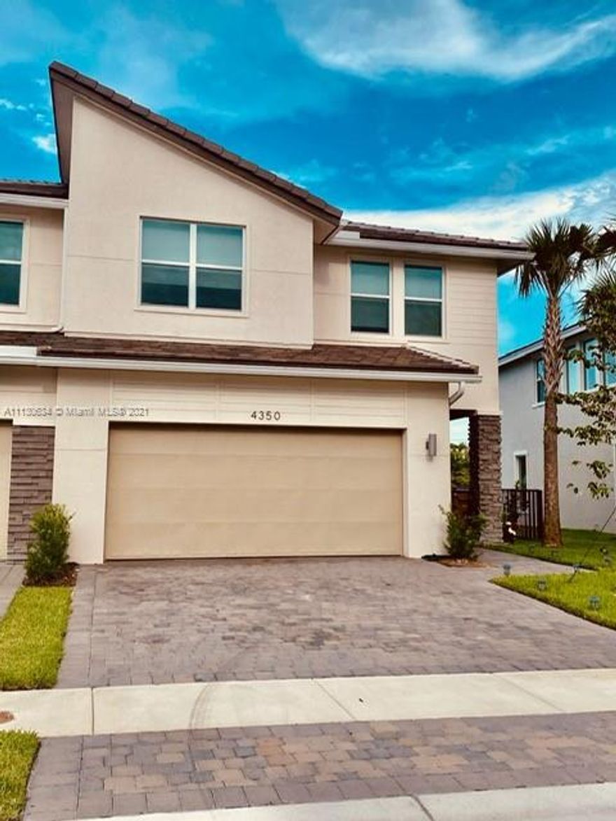 Amazing corner townhouse in mastered planned community Veleiros at Crystal Lakes. This beautiful lakefront Property features three bedrooms, 2.5 baths, and 2 car garage. Must See !