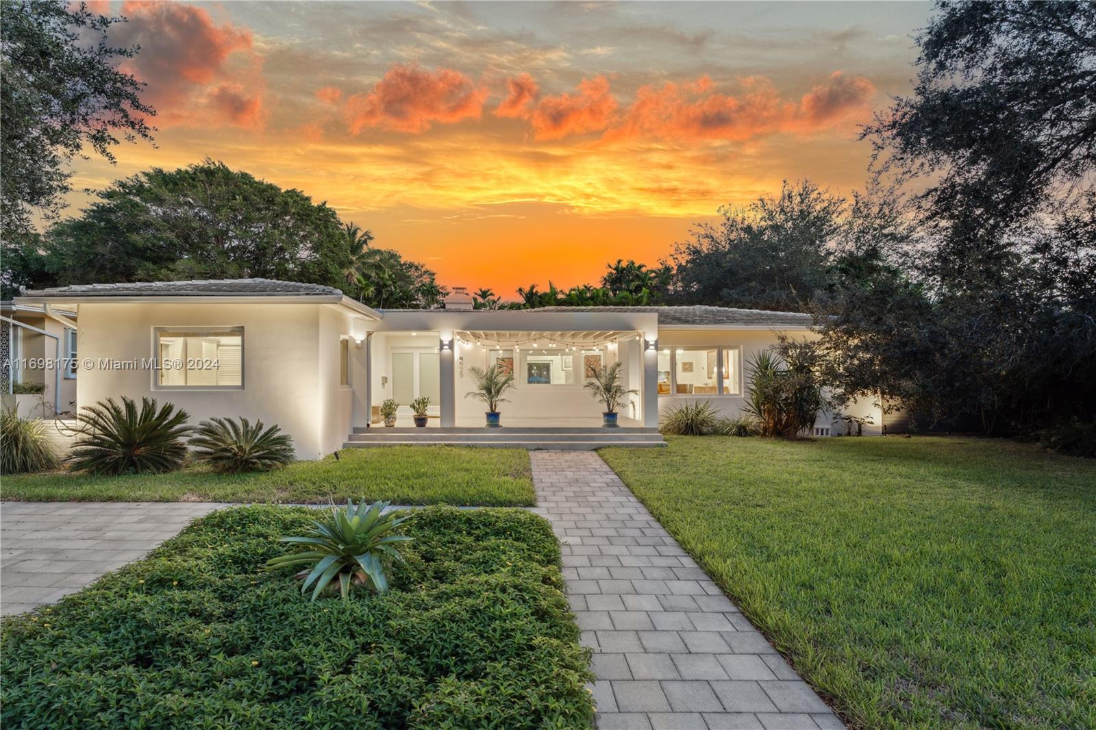 Stunning Mid-Century Retreat in Miami Shores. Welcome to this beautifully renovated 3 bed, 3.5 bath Mid-Century gem, boasting 2,260 net livable sq ft and 3,391 total sq ft. Since purchased, the entire home has undergone a meticulous transformation:iTALKRAFT Kitchen;Thermador Appliances(gas stove-cooktop); Luxurious baths;Impact windows & doors;Refinished wood floors;Expansive front & back porches;LED pool & pool deck;Outdoor Kitchen and Bar. Perfectly located for Miami enthusiasts, enjoy:Walking distance to downtown Miami Shores;Easy access to Design District, Wynwood, Brickell & Beaches. Come and see why this home offers the ultimate blend of style, comfort and convenience!