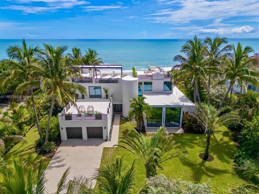This rare luxury masterpiece redefines exclusivity in Brevard County. Fully renovated with 3 bedrooms & 3.1 baths, offers 4,107 sq. ft. of elegance and 125 feet of direct oceanfront. The 3,000 sq. ft. rooftop deck provides stunning Atlantic views and rocket launch vistas. Key features include a custom pergola, state-of-the-art summer kitchen, private beach path, and hurricane-impact doors. The expansive primary suite spans the second floor with a wrap-around balcony and spa-like bath. Every detail, from premium appliances to custom floating stairs, exudes sophistication and coastal allure.