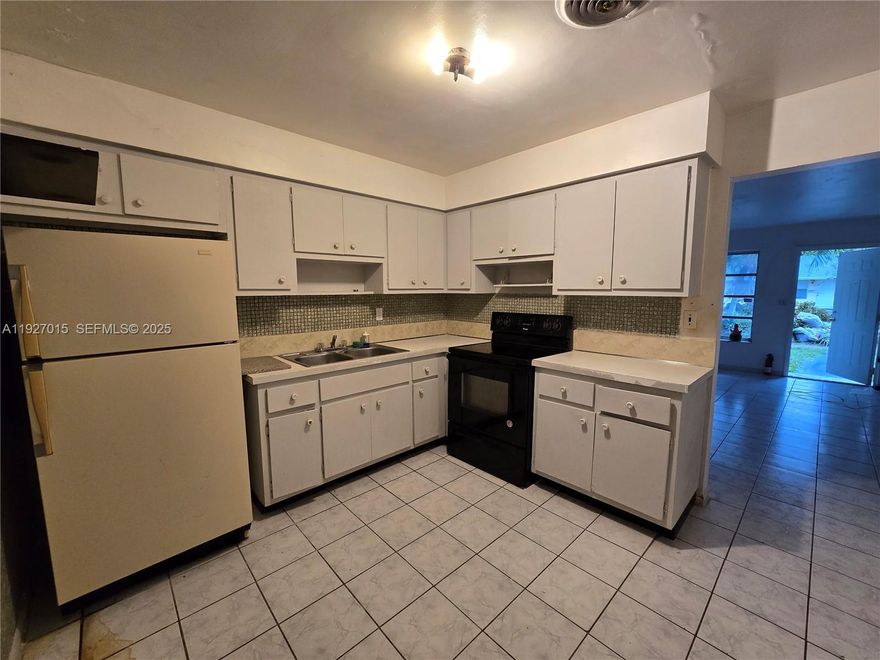COZY SPACIOUS HOUSE 2 BEDROOM 1 FULL BATHROOM PLUS DEN, TILE FLOOR, LAUNDRY ROOM, WASHER AND DRYER HOOK UPS. CENTRAL A/C, FENCED YARD, MANGO TREE, SMALL PETS OK. TENANTS PAYS FOR ALL UTILITIES; OWNER REQUIRED $200 DEPOSIT FOR WATER. NO ASSOCIATION NO WAITING. EASY TO SHOW.