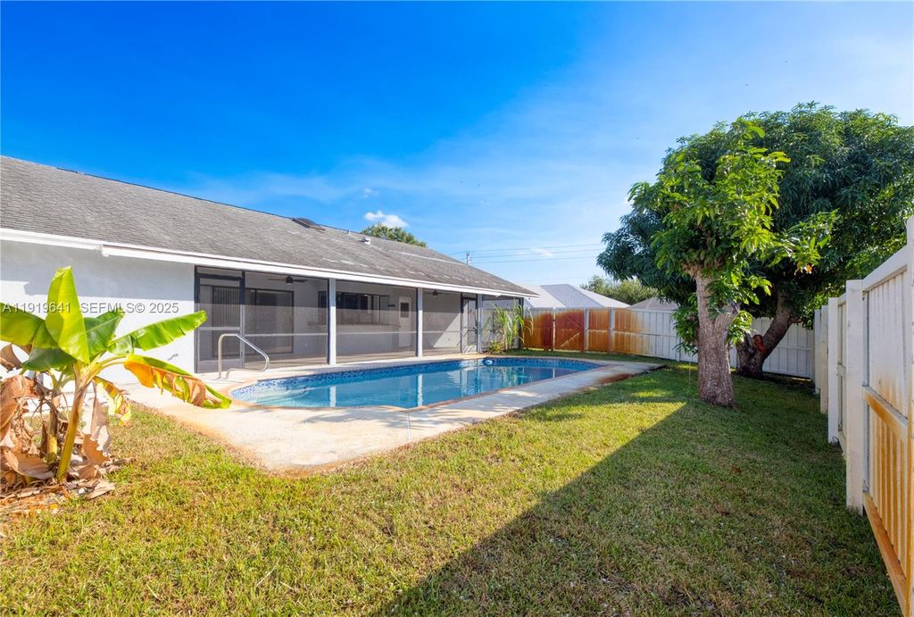 Photo of 5402 NW Emblem St, Port St Lucie, FL 34983 (MLS # A11919641)