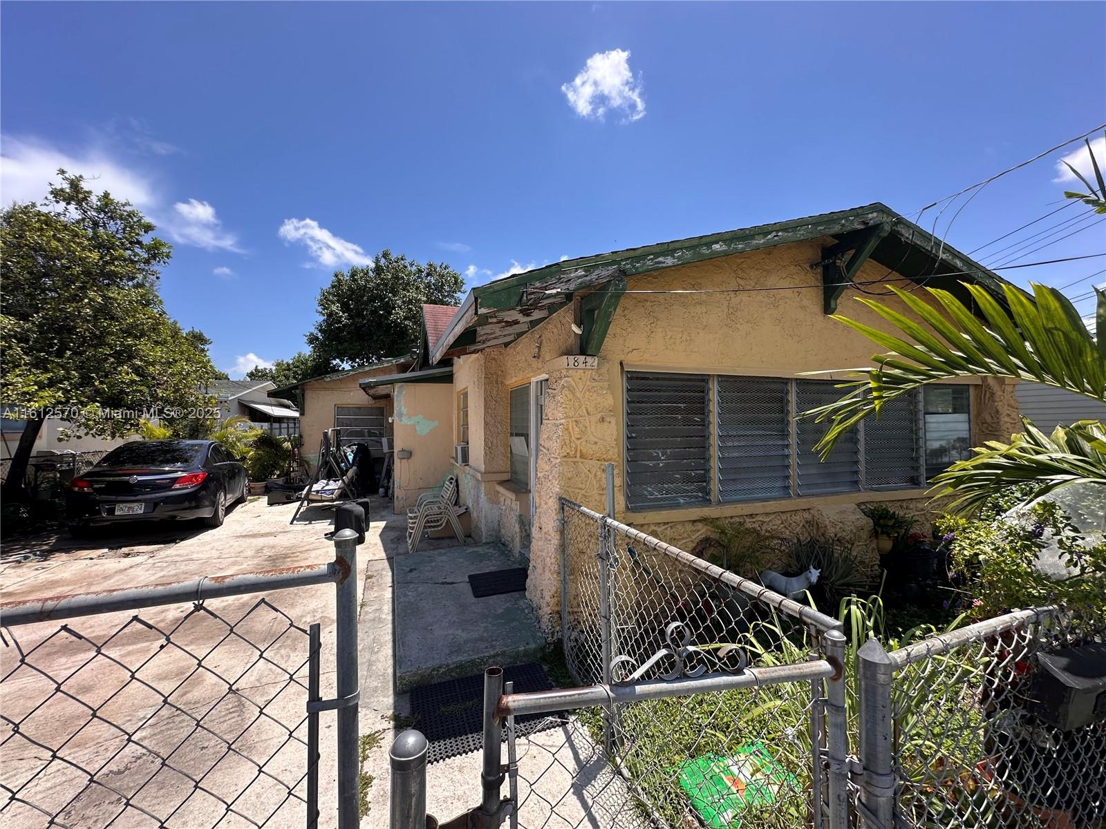 SELLER IS NOW MOTIVATED!! Location, Location, Location! Great opportunity for investors or homeowners. Property has access by two streets 1842 NW 18th Terr and 1842 NW 18th St. Property is a 6 Bedroom 4 Bathrooms. In the front you have 2 units that are 1/1s and in the back you have a 3/1 also a 1/1 that is attached. Walking distance from the TimeLine of Miami Building, Miami River between River Cove Marina and Hurricane Cove Marina & Boatyard. Minutes from University of Miami Hospital, Jackson Memorial Hospital and Miami-Dade Attorney's Office. Property is being offered As-Is and all offers must be accompanied with a proof of funds. Please call Listing agent for appointments and more information.DO NOT DISTURB TENANTS. Rent is way below market value!