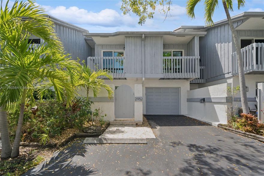 Spacious and renovated townhome ideally located in the beautiful Harbour Club community, minutes from the beach in Delray Beach. Volume ceilings and newly installed impact windows and doors (2023) throughout the entire property provide bright and spacious living areas within the 3 bedroom, 2 and half bath property. A large private front entry porch, generous patio/backyard area and upper level balconies offer multiple outdoor sitting and entertaining areas uncommonly found. Other features which make this property stand out include new AC (2022), newer flooring, renovated bathrooms, a new water osmosis system, newer washer/dryer and new garage motor/machinery board.
