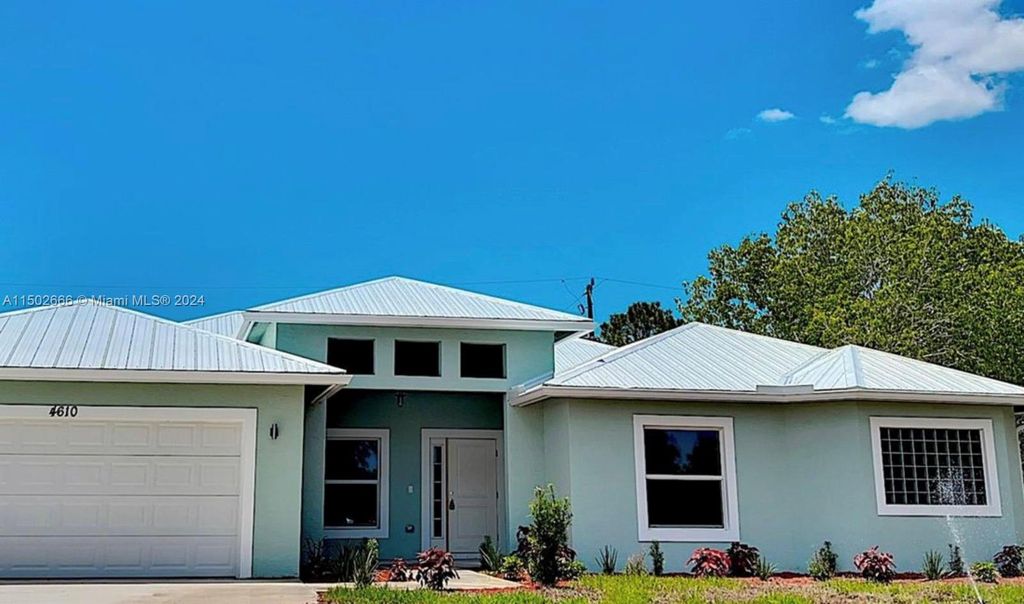 Photo of 4610 SW Quezon St, Port Saint Lucie, FL 34953 (MLS # A11502666)