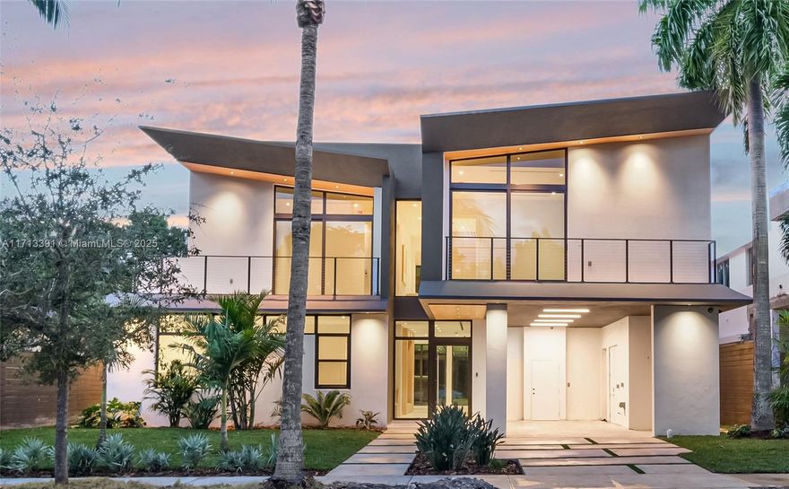 Brand-new custom luxury pool home in Coconut Grove on a 6,875 sq. ft. lot, offering 4,757 total sq. ft. of modern elegance. This smart home is pre-wired and features 4 beds, 4.5 baths, and a stunning great room with floor-to-ceiling windows. Highlights include custom millwork, a high-efficiency AC, Sonos integration, natural gas, an art showcase or wine cooler wall, and a butler's pantry. The chef’s kitchen boasts custom countertops, Miele and Wolf appliances, while the primary suite offers a spa-like steam shower. Lush landscaping, a wrap-around balcony, poolside retreat, and outdoor BBQ kitchen enhance serenity. A durable concrete roof provides storm protection.  Near Grove Village, restaurants, Top Schools. this North Grove home defines modern luxury.