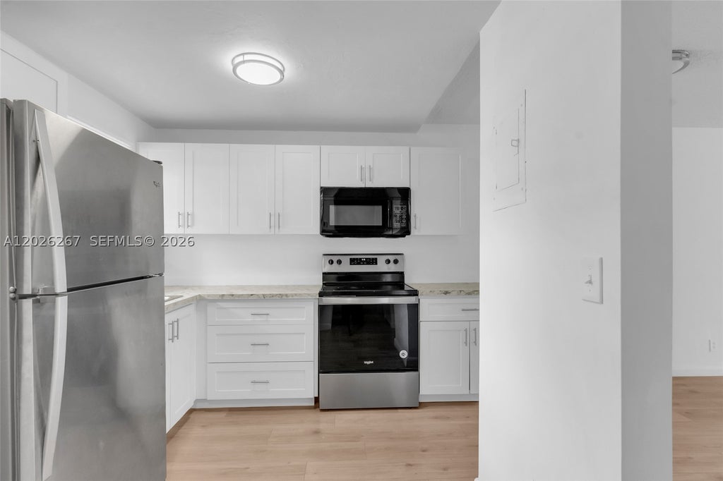 Photo of 9601 Sunrise Lakes Blvd #106, Sunrise, FL 33322 (MLS # A12026267)