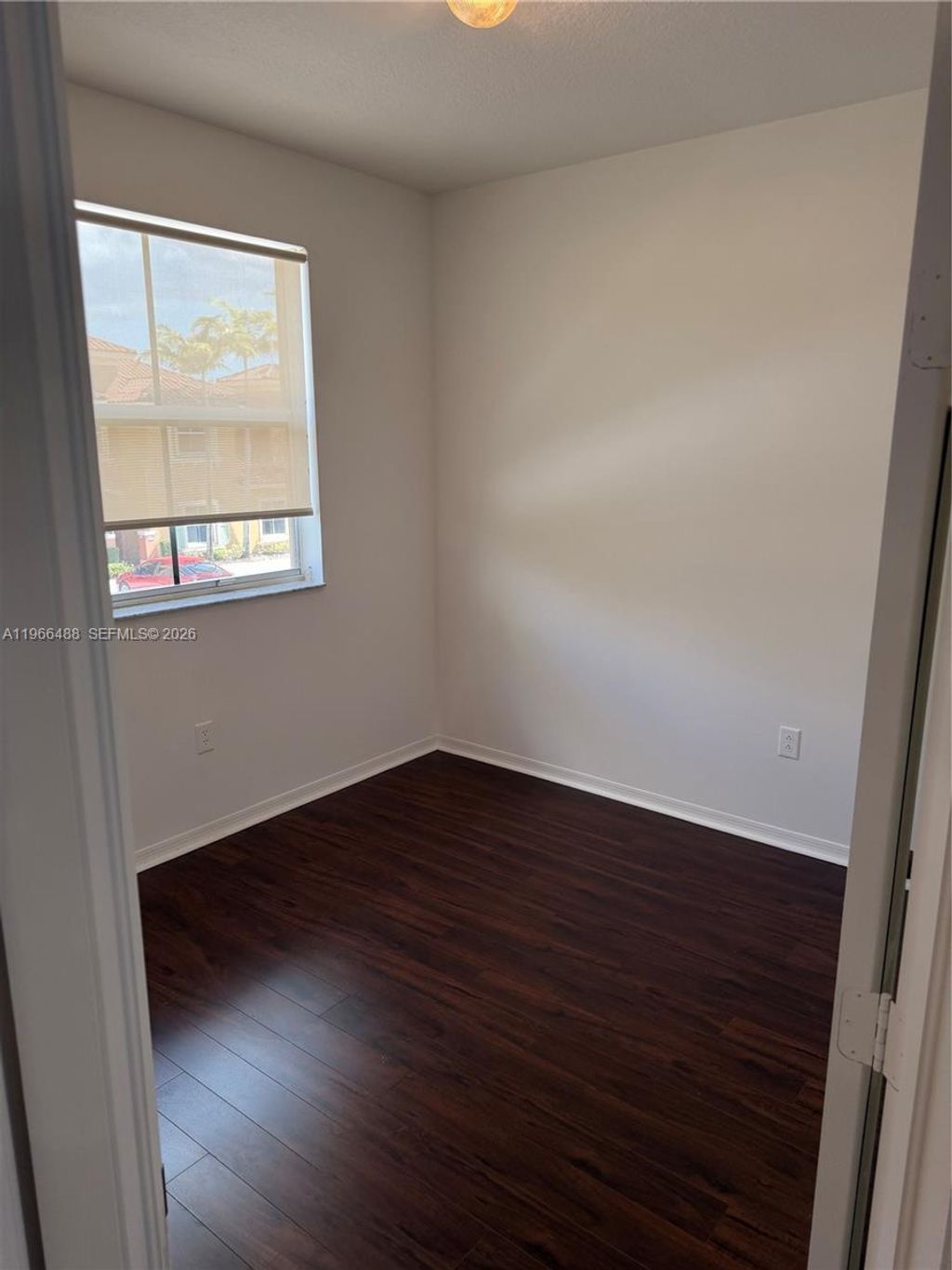 Photo of 906 SW 143rd Ave, Pembroke Pines, FL 33027 (MLS # A11966488)