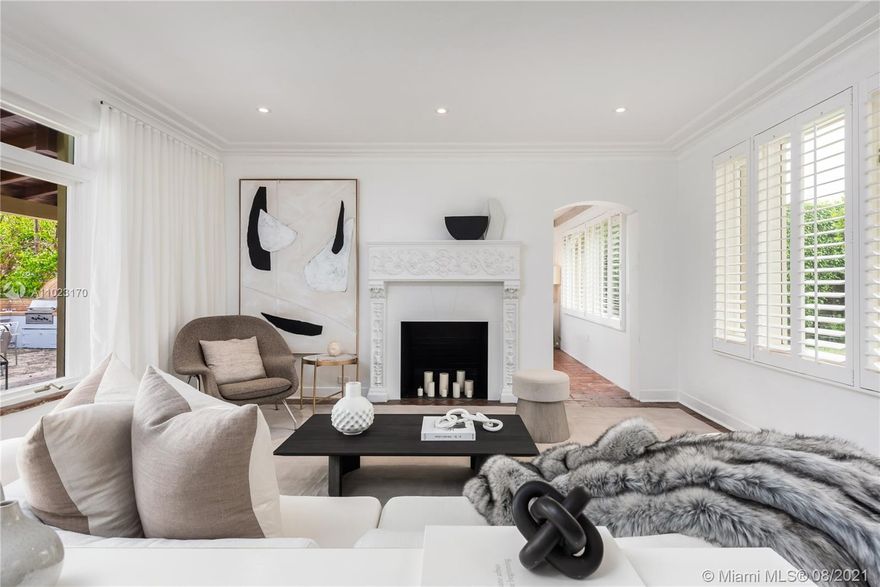 Enjoy quintessential Miami Beach water views from this classic Mediterranean estate on the exclusive guard gated Allison island. This well-appointed property offers four bedrooms and staff quarters on an oversized 16,200sqft lot. Boaters enjoy 75 feet on the water with private dock and easy access to Ocean or Biscayne Bay. With only 50 waterfront homes, Allison Island offers its residents the ideal mid beach location near LGCC, the Beach, Mount Sinai, Highways and Bal Harbor Shops! Home fully furnished and designed by professional design team. Current proposal for new guard gate by Domo Architecture + Design.