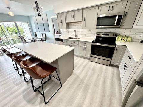 Photo of 400 Diplomat Pkwy #410, Hallandale Beach, FL 33009 (MLS # A11894822)