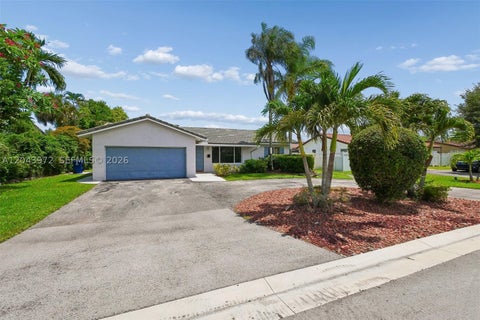 Photo of 7506 NW 42nd St, Coral Springs, FL 33065 (MLS # A12043972)