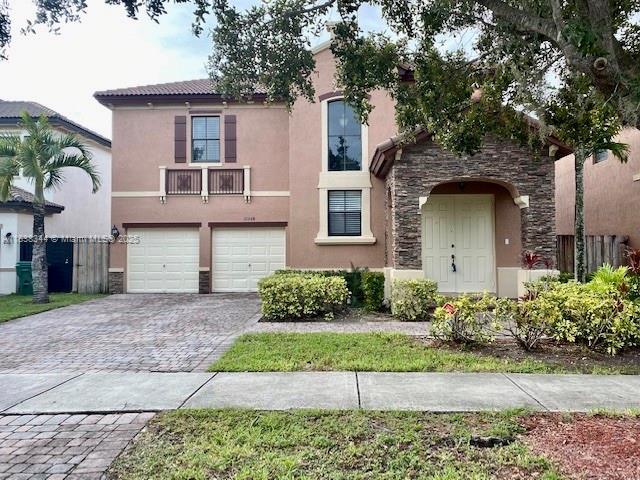 Beautiful and spacious home located in the desirable Silver Palms community. This 3-bedroom, 2.5-bath residence features a generous primary suite and a large loft on the second floor—perfect for a home office or sitting area. The home boasts tile flooring throughout with elegant wood stairs, soaring ceilings, and a bright, open layout. The kitchen is equipped with stainless steel appliances, granite countertops, and a center island, ideal for cooking and entertaining. Additional highlights include a separate laundry room, a two-car garage, and a private fenced patio with a lush garden. Enjoy the amenities including a clubhouse, pool, gym, kids’ playground, and more. Conveniently located near the Turnpike, shopping, and dining. EASY TO SHOW.