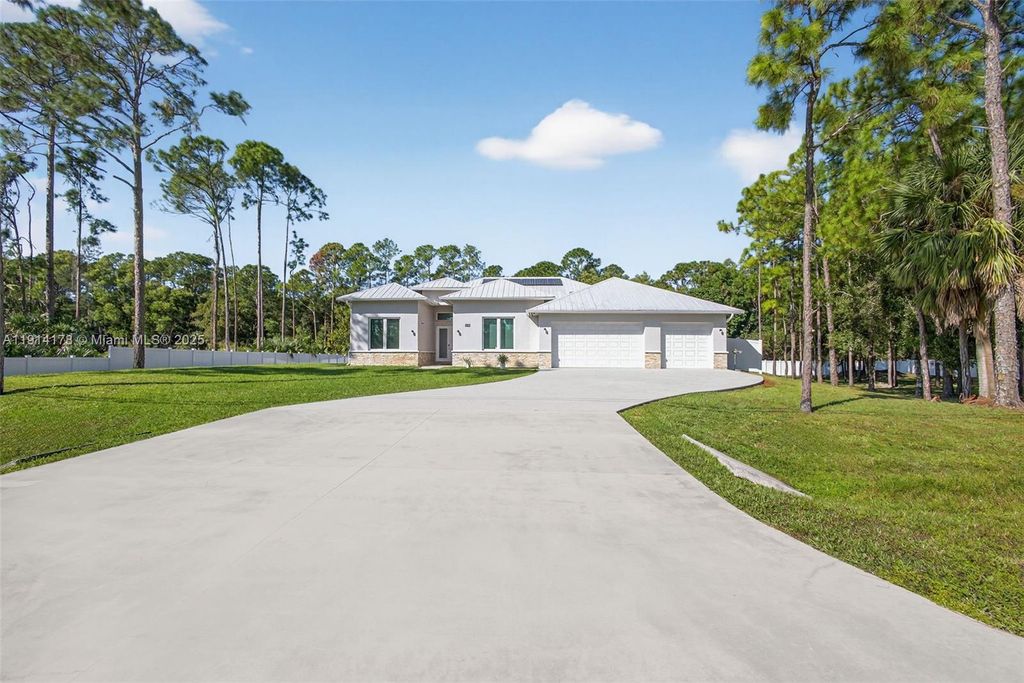 Photo of 18369 Mellen Ln, Jupiter, FL 33478 (MLS # A11914178)