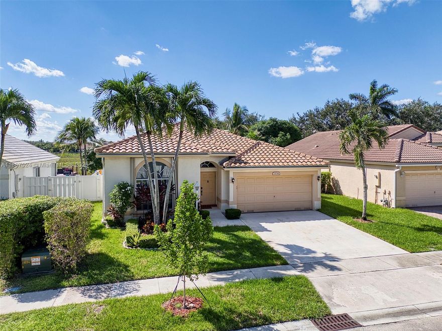 Welcome to this single story 4BR/3BATH waterfront home in the desirable gated community Pembroke Falls. This feature a new 2023 roof & AC. Remodeled kitchen 2023 , accordion shutters, City natural gas service-a rare feature, 2-car garage, plus spaces in driveway. Generous backyard perfect for outdoor entertaining and room for a pool. HOA includes fiber internet, cable, alarm, sprinkler water & 24/7 security. Residents enjoy resort-style amenities: a clubhouse, resort pool, kids’ splash zone, tennis, pickleball, basketball, fitness center, walking trails, and more. Prime location near highways, shopping, dining & hospitals. No HOA approval—can be rented immediately. Owner relocating out of state. Visit today and bring your offer – this home is priced to sell!
