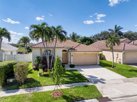 Photo of 2034 NW 145th Ave, Pembroke Pines, FL 33028 (MLS # A11887024)