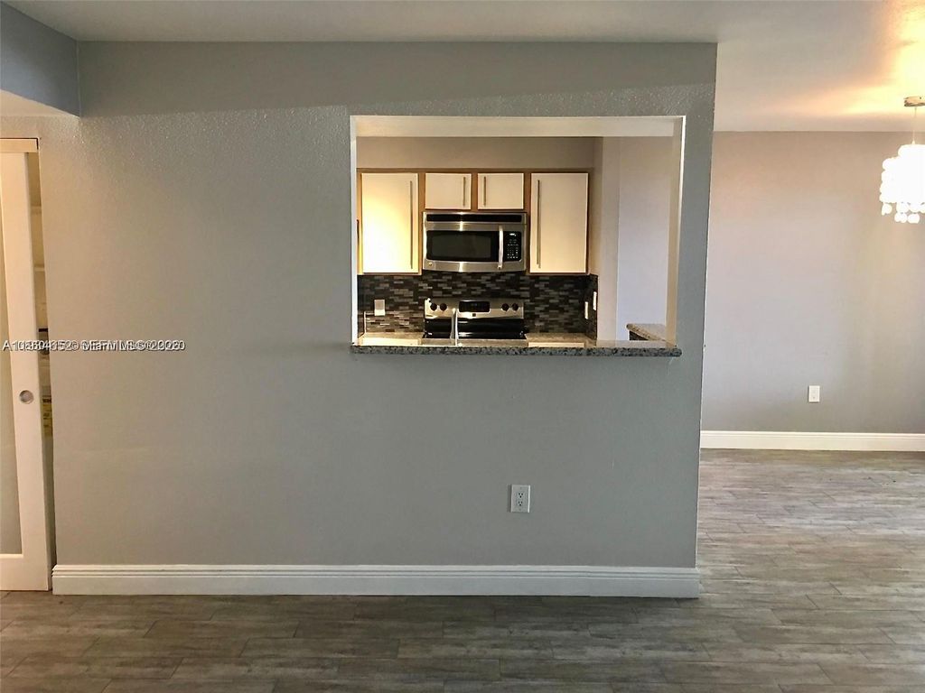 Photo of 2445 NW 33rd St #1404, Oakland Park, FL 33309 (MLS # A11934652)