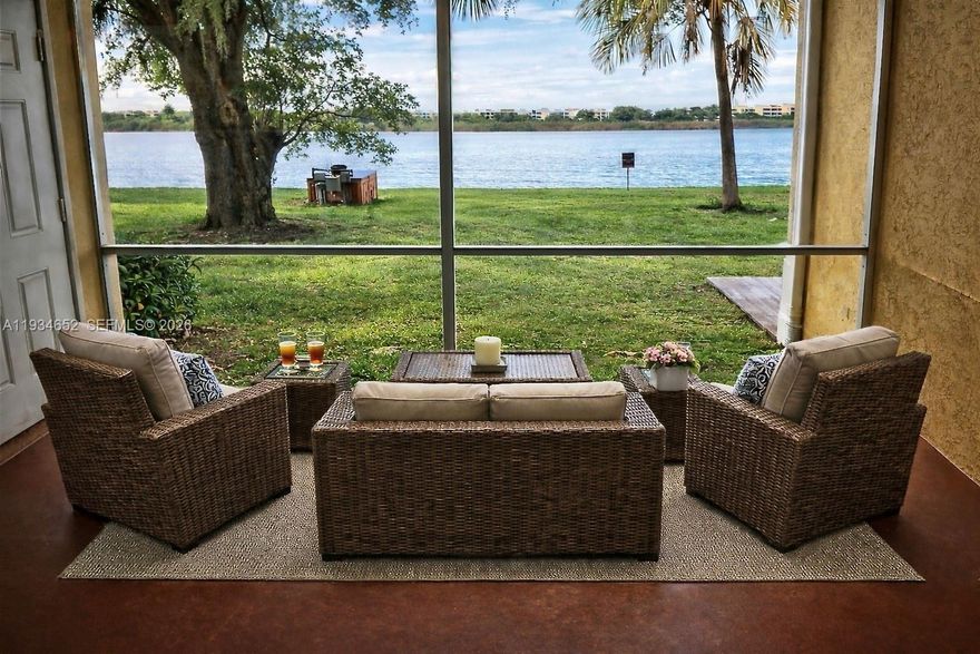 First-floor 2-bedroom, 2-bath condo located in the Sailboat Pointe community. The unit features an open floor plan, an in-unit washer and dryer, ample storage, and a screened patio with stunning lake views, freshly painted, and LED lights. The gated community is situated on approximately 50 acres of lakefront property and is designated as a Certified Wildlife Habitat. Amenities include a community pool, hot tub, fitness center, tennis and pickleball courts, clubhouse, walking trails, and ample guest parking.