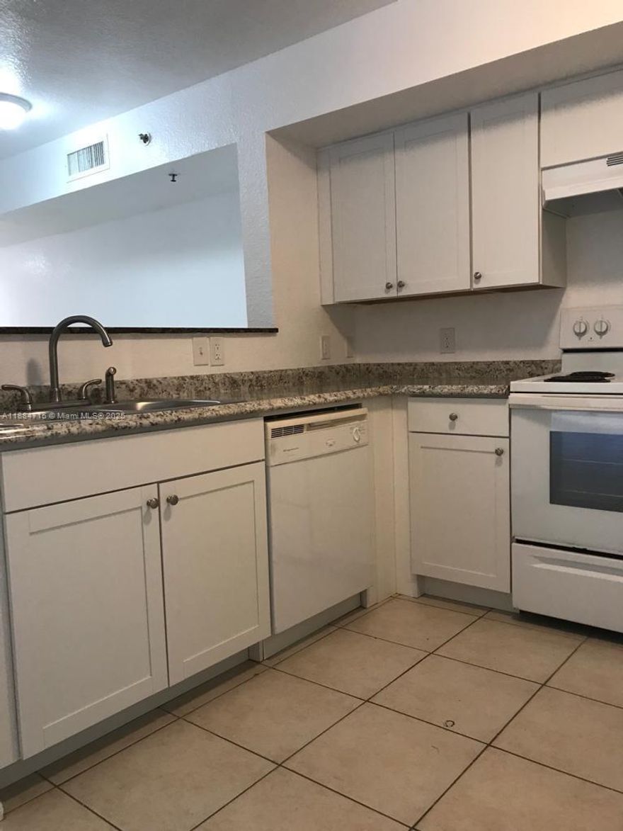 s spacious apartment in the heart of North Miami. Boasting three bedrooms and two bathrooms, this unit features a thoughtfully designed open layout where the kitchen countertop seamlessly connects the kitchen and dining room, perfect for both entertaining and daily living. The master bedroom and second bedroom each offer walk-in closets, providing ample storage and organization.  Washer/Dryer in unit, balcony to relax on and so much more await!