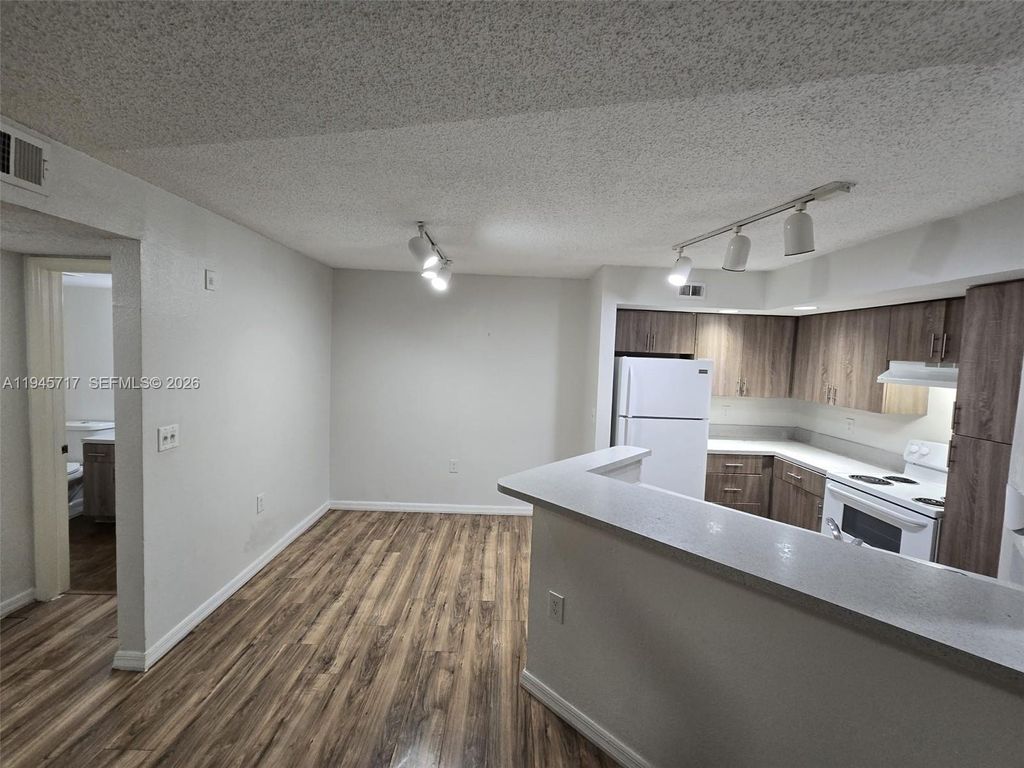 Photo of 12730 Vista Isles Dr #815, Sunrise, FL 33325 (MLS # A11945717)