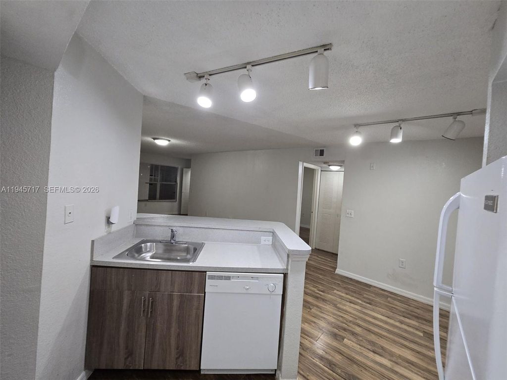 Photo of 12730 Vista Isles Dr #815, Sunrise, FL 33325 (MLS # A11945717)