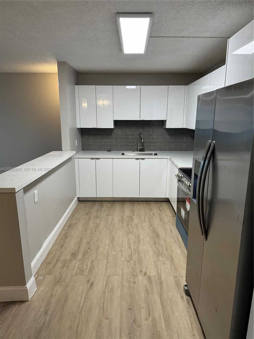 section 8 welcome. pet welcome. Beautiful newly remodeled very spacious 2 bed 1.5 bathroom condo for rent Meticulously remodeled. Every square inch of this unit has been completely redone. Enjoy a beautiful kitchen with quartz counters and new stainless steel appliances. Bathrooms have been designed to match the kitchen, solid wood cabinetry, quartz countertops. Newly installed a/c unit (2024) and electric water heater! Beautiful vinyl plank flooring throughout for durability and easy to clean. $500 refundable deposit and approval required from Condo Association prior to move-in