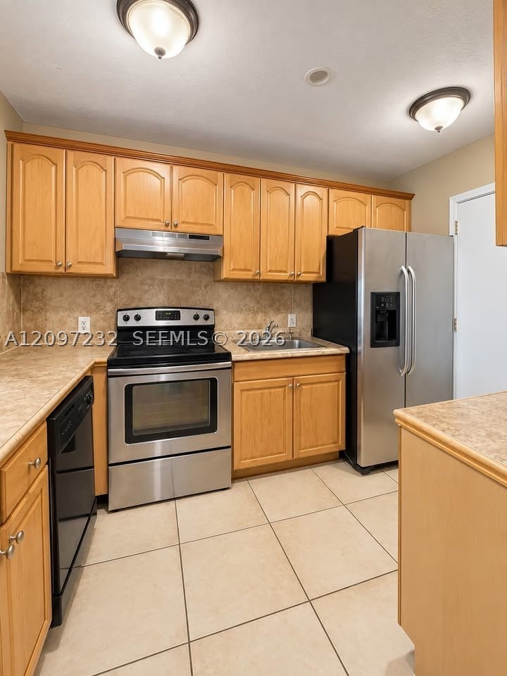 Photo of 4848 NW 24th Ct #436, Lauderdale Lakes, FL 33313 (MLS # A12097232)