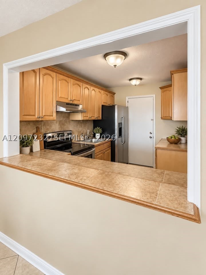 Photo of 4848 NW 24th Ct #436, Lauderdale Lakes, FL 33313 (MLS # A12097232)