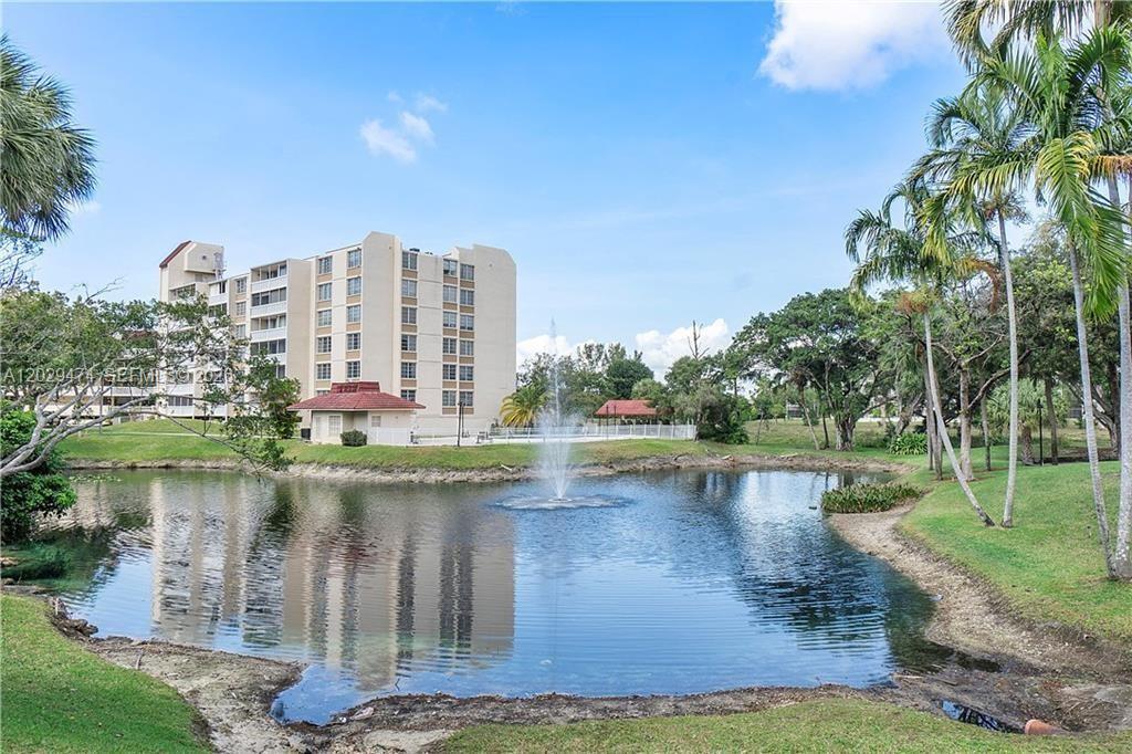 Photo of 7081 Environ Blvd #242, Lauderhill, FL 33319 (MLS # A12029474)