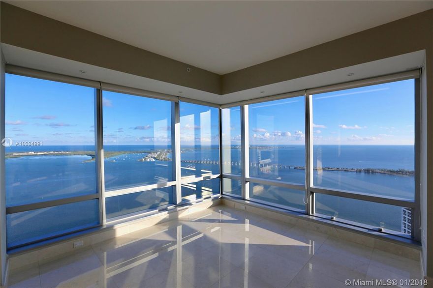 Unobstructed panoramic ocean and bay views from Key Biscayne to Miami Beach! Best line in the building! Beautifully finished SE Corner unit with entry foyer leading to an open floor plan with floor to ceiling windows offering spectacular water views. Marble floors throughout, custom eat-in kitchen with Viking appliances, double ovens and custom bar in living room. Large master suite with Jacuzzi, separate shower with ocean views and walk-in closets. All en-suite bedrooms with double vanities. Two Equinox gym memberships included. 5-star amenities. Also available for lease for $15,000.00 per month.