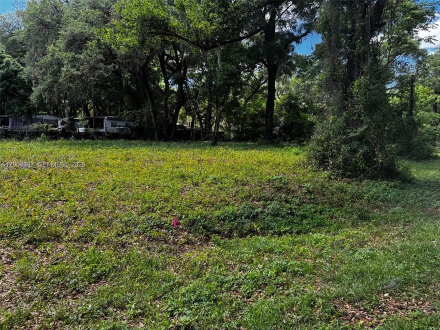 Build your vision on this prime corner lot in the growing Ocala area. This cleared and build-ready property offers a seamless start for your next home or investment project—no additional clearing required. Positioned in a developing neighborhood, this lot provides both immediate convenience and long-term value.

Enjoy easy access to major roads, making commuting simple while staying close to nearby shopping centers, restaurants, schools, and everyday essentials. Plus, you’re just a short drive from the renowned World Equestrian Center, a major attraction that continues to boost the area’s growth and appeal.

Ocala is attracting new residents and investors thanks to its affordability, natural surroundings, and expanding infrastructure. With no HOA restrictions, you’ll have the freedom to design and build according to your preferences without added fees or limitations.

Whether you're looking to build your dream home or expand your investment portfolio, this property offers the flexibility and location to make it happen. Don’t miss this opportunity to secure a ready-to-build lot in one of Ocala’s steadily growing areas!