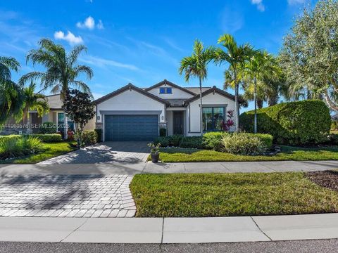Photo of 11950 Macquarie Way, Fort Myers, FL 33913 (MLS # A11960576)