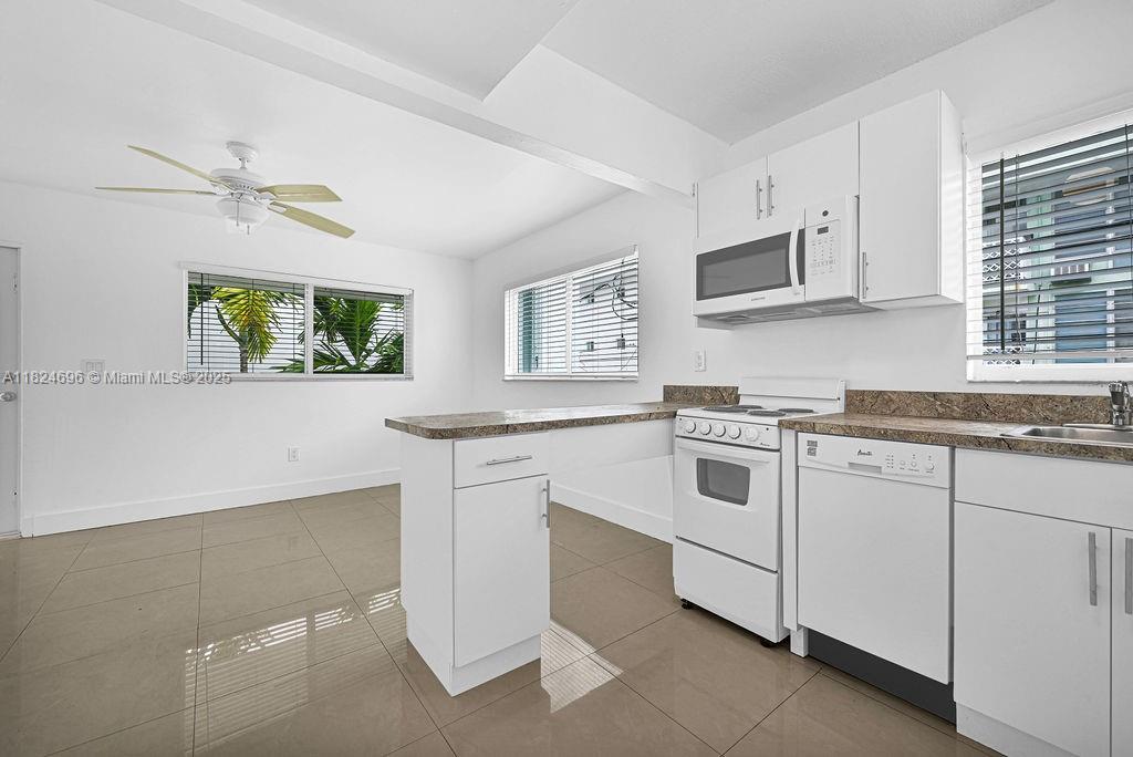 Walk to ocean, Flamingo Park, Lincoln Road, shops and restaurants. Remodeled corner 1 bedroom, 1 bath apartment in gated building with assigned parking. Central a/c, dishwasher, washer & dryer in the building. Window blinds, balcony, porcelain floors, hurricane shutters, impact door. Excellent area only one block to Flamingo Park swimming pool, tennis courts, soccer field, etc. Small pets OK. Easy to show. Please go to ShowAssist.