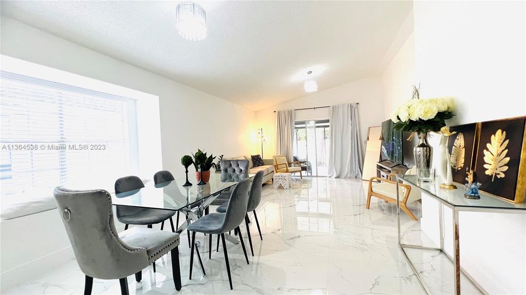 Photo of 1404 Corn Flower Ln, West Palm Beach, FL 33415 (MLS # A11364538)