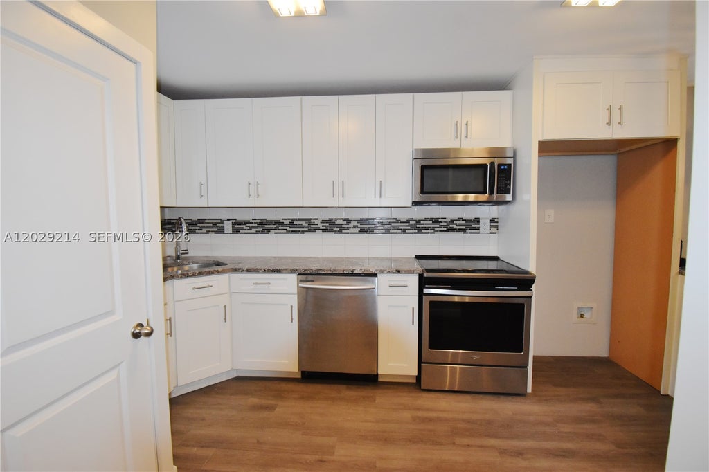 Photo of 6080 NW 44th St #201, Lauderhill, FL 33319 (MLS # A12029214)