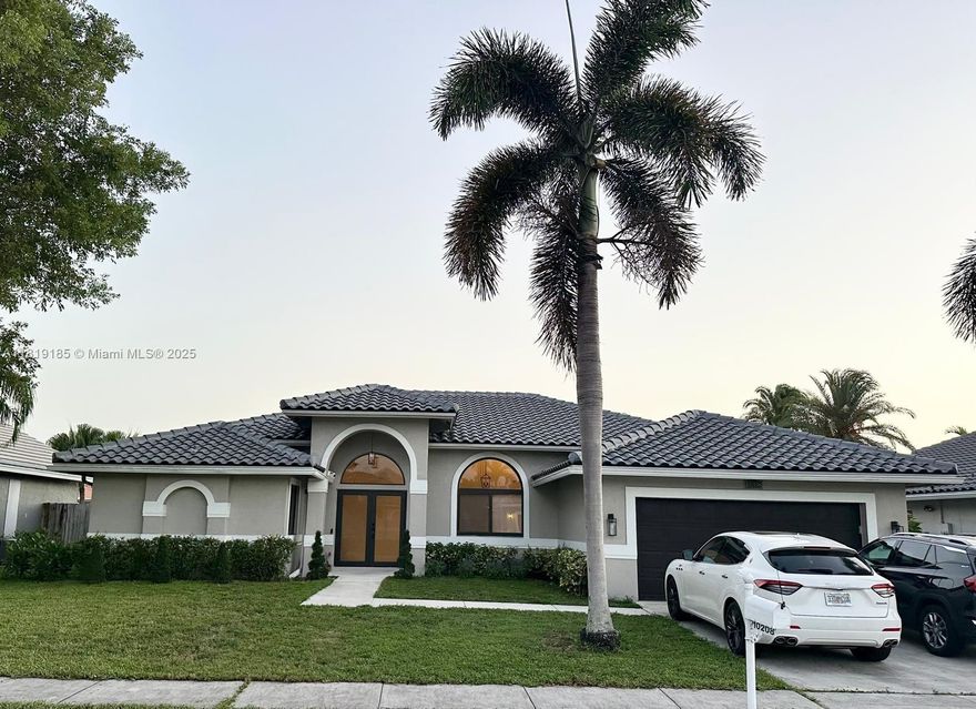 Spacious home, high ceilings, 4 large bedrooms, 2 full baths, open floor plan, oversized waterfront lot, and a large pool. Fully renovated with high-end finishes. Custom made closets in all rooms. Contemporary kitchen with lots of cabinet storage, a hidden coffee bar, pantry, oversized island counter that seats 8. Modern baths, a spa bathtub in the master bath. All new light fixtures. New Italian porcelain floors, impact windows/doors, new roof. Direct lake views (sunset views), Outdoors: sandblasted marble pavers, renovated pool with new heater, salt water system, and fountain. New custom large wood pergola. All fenced in for privacy. New landscaping. No association approval needed. 2 mins from Pines City Center, great schools, quick access to Turnpike, shopping centers & restaurants.