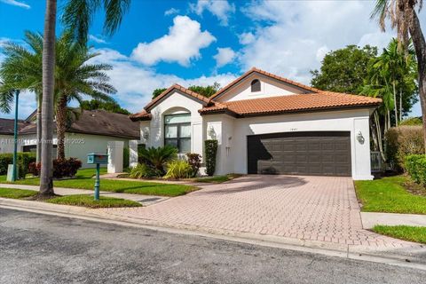 Photo of 1441 E Lacosta Dr E, Pembroke Pines, FL 33027 (MLS # A11891041)