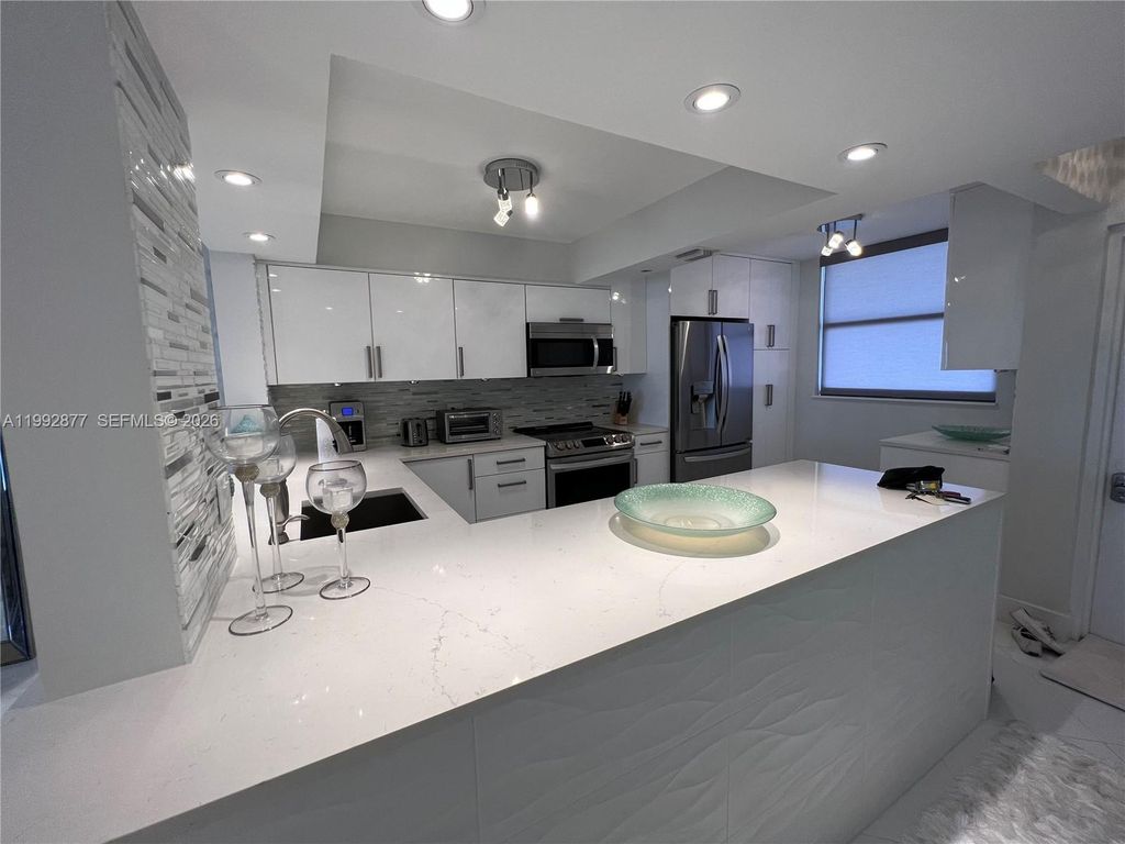 Photo of Deerfield Beach, FL 33442 (MLS # A11992877)
