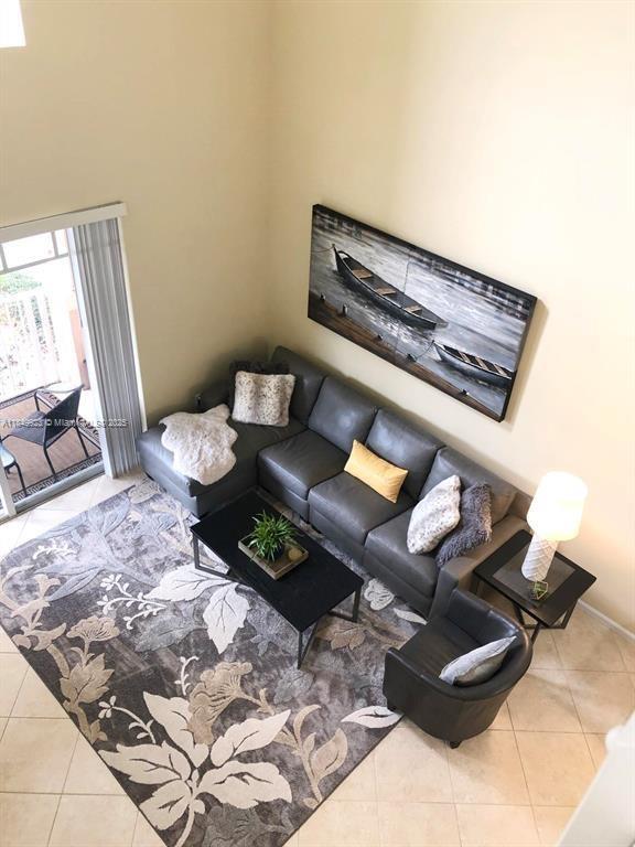 Available 9/1/25! Fully Furnished Condo in the heart of Town Center! This light and bright 2 Bedroom, 2 Bath condo has been beautifully decorated with beautiful furnishings. newer appliances, washer/dryer and fresh paint. New carpet has been installed in the loft and bedrooms, with ceramic tile in the main living and dining space. The cathedral ceilings in the living room open up to the second floor loft and look over the big windows and sliders out to the front balcony. A second balcony off the kitchen overlooks the garden area. Unit is next to the pool and gym facility. Walking distance to Roger Dean Stadium, Town Center restaurants and shops, FAU, Scripps, and Golden Cub Mini Golf. Just 10 minutes to beaches, Movie Theaters, Golfing, Boating and more. *Utilities, internet and cable inc.