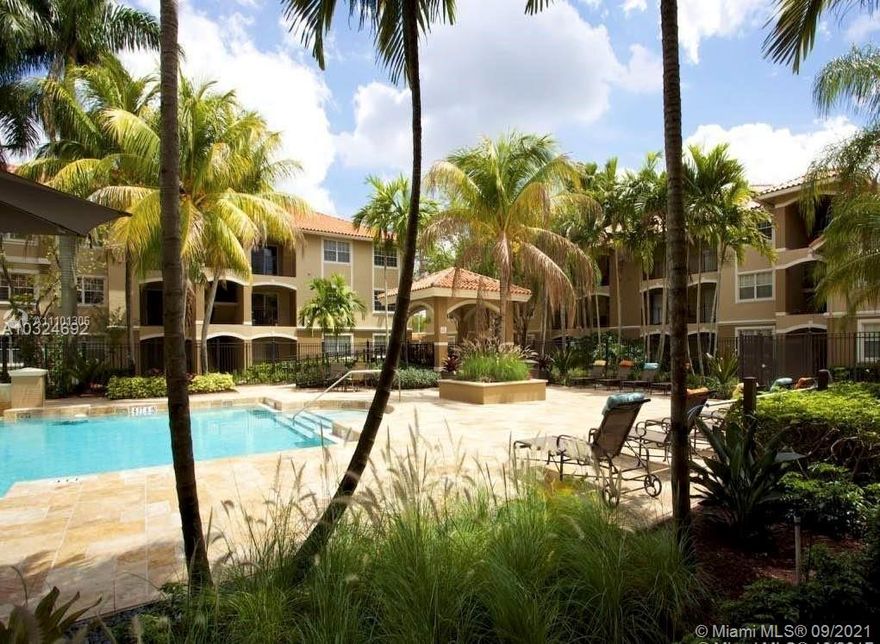 Beautiful water view 2/2 unit with one assigned parking space plus a ROOFED CARPORT. This is the luxury Marquesa unit and is nicely equipped with an elegant kitchen with granite countertops and black appliances. Tile in kitchen, dining and living rooms. Lots of amenities: resort style pool with veranda, Jacuzzi, fully equipped gym, indoor racquetball court, children's playground, BBQ area, and much more. Community located right across the Pembroke Lakes Mall. Privileged area close to everything. The Showing are from 9:00 am to 7:00 pm Monday to Saturday.
